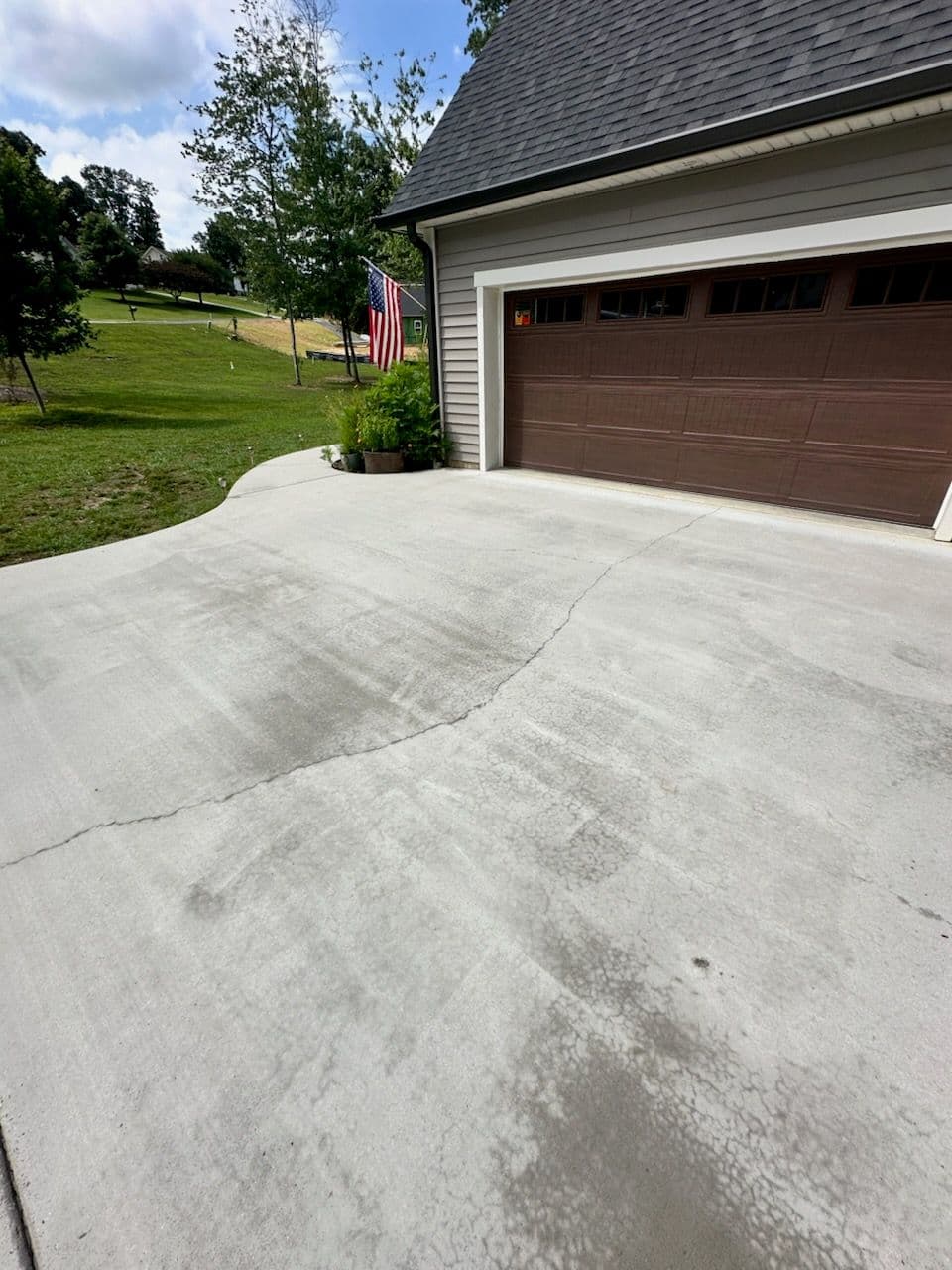 Stunning Driveway Makeover with Concrete Cleaning image
